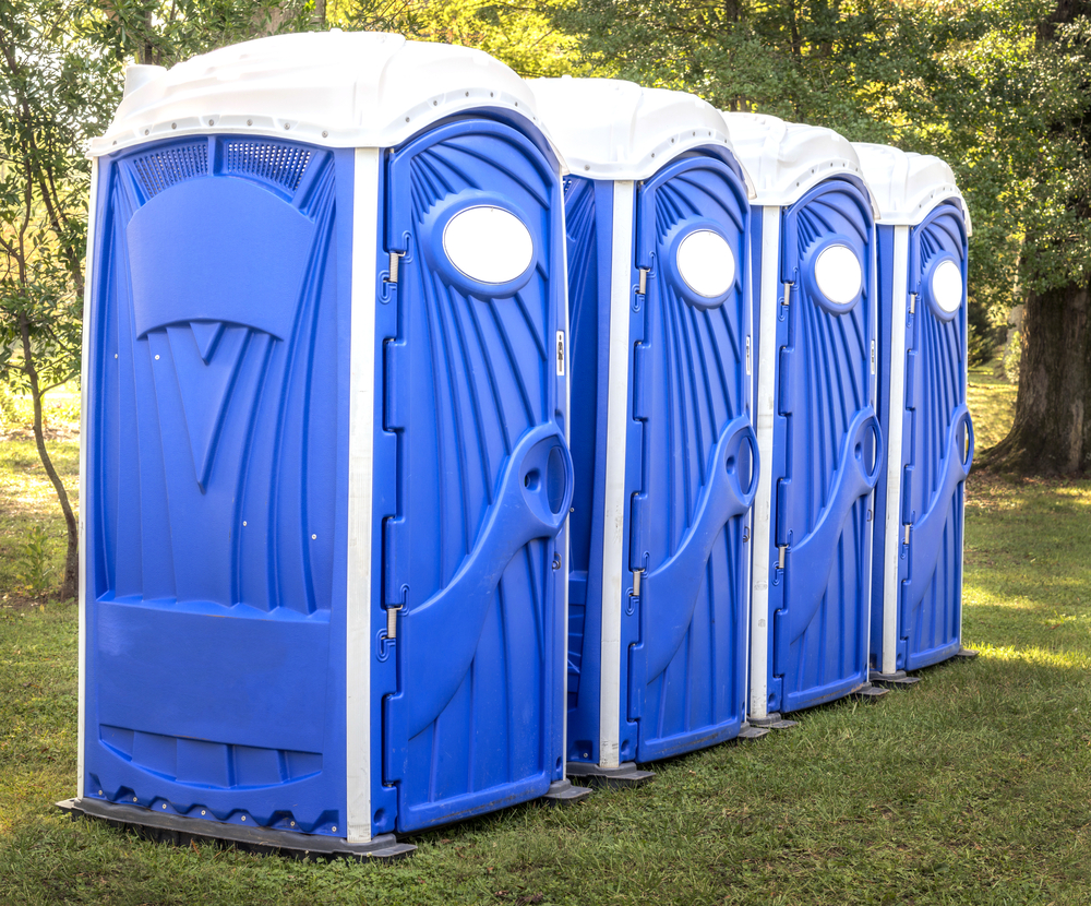 Horizontal,Shot,Of,Blue,Port,Potties,Or,Portable,Toilets