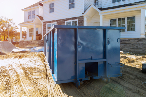 Blu,Dumpster,,Recycle,Waste,And,Garbage,Bins,Near,New,Construction